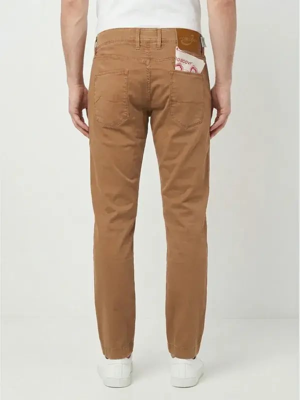 The same trousers worn, seen from the back, AI-generated photo